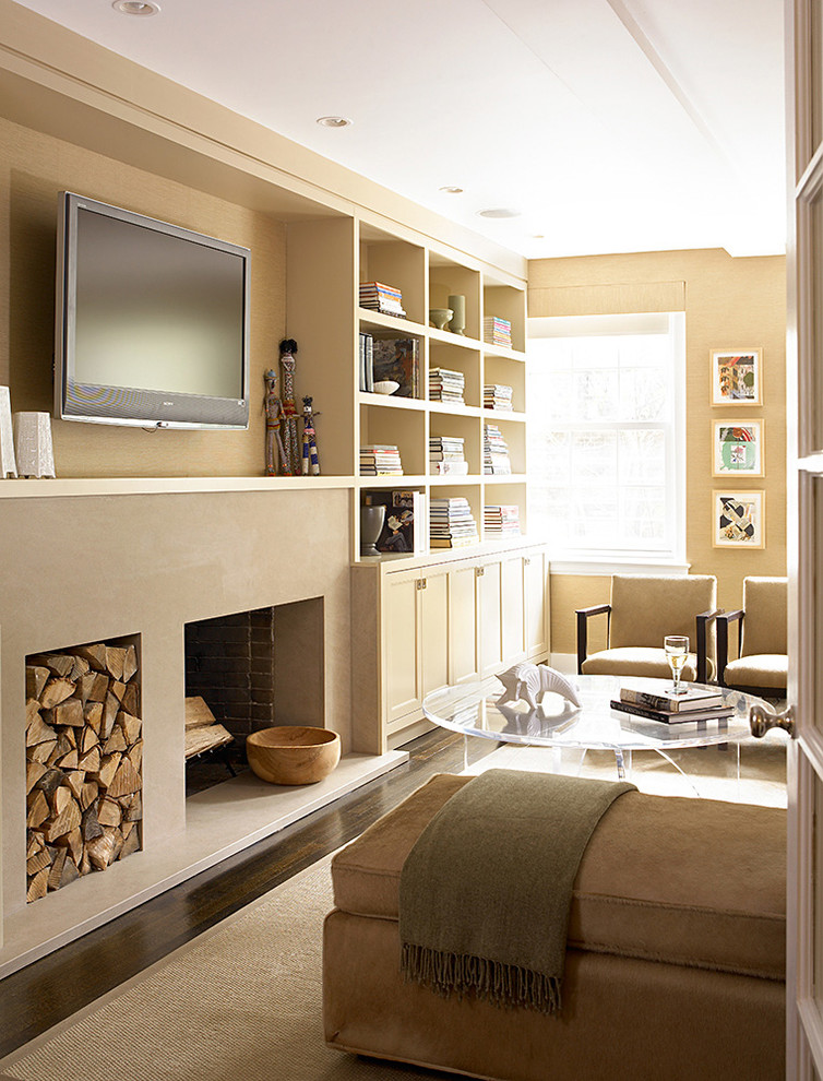 Example of a transitional dark wood floor and brown floor living room design in New York with brown walls and a standard fireplace