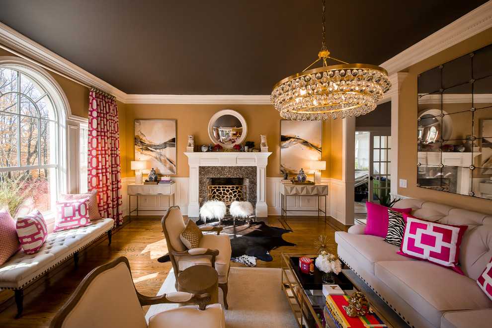 На фото: изолированная гостиная комната среднего размера в классическом стиле с паркетным полом среднего тона, фасадом камина из дерева и коричневым полом с