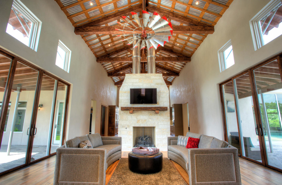 Inspiration for a farmhouse living room remodel in Austin with gray walls