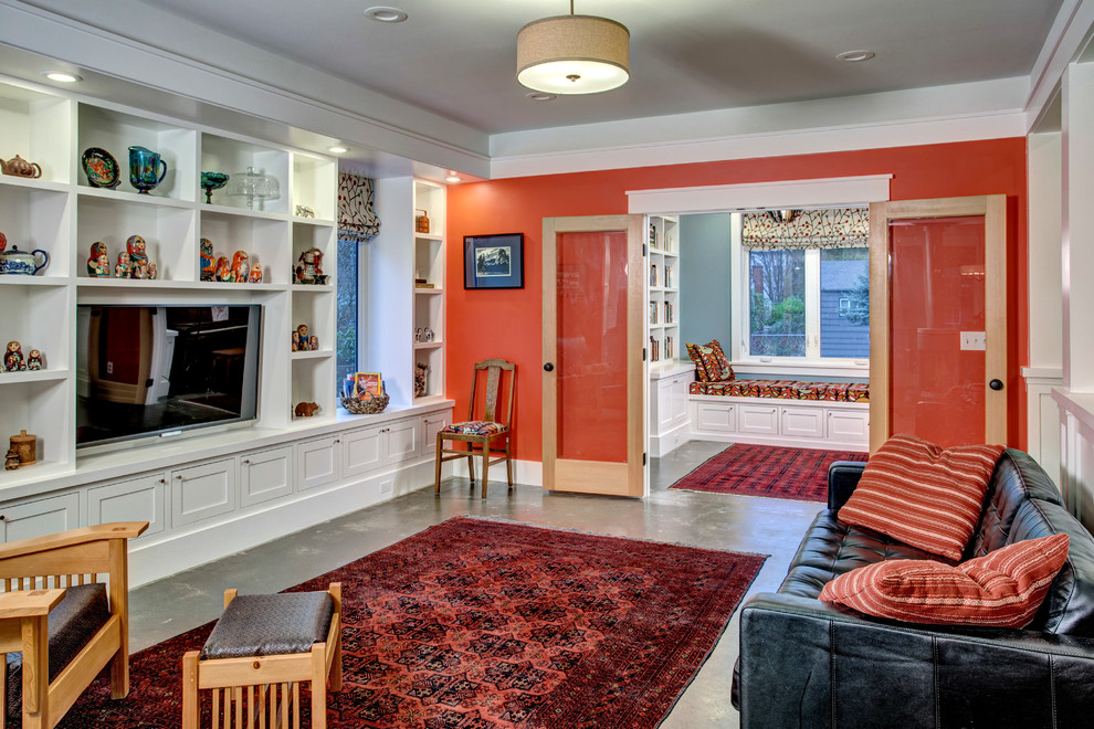 Example of a mid-sized arts and crafts open concept concrete floor living room design in Seattle with red walls and a media wall