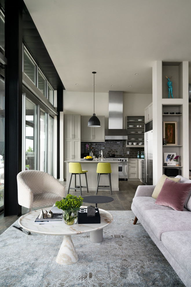 Inspiration for a medium sized industrial open plan living room in Seattle with grey walls, medium hardwood flooring and grey floors.