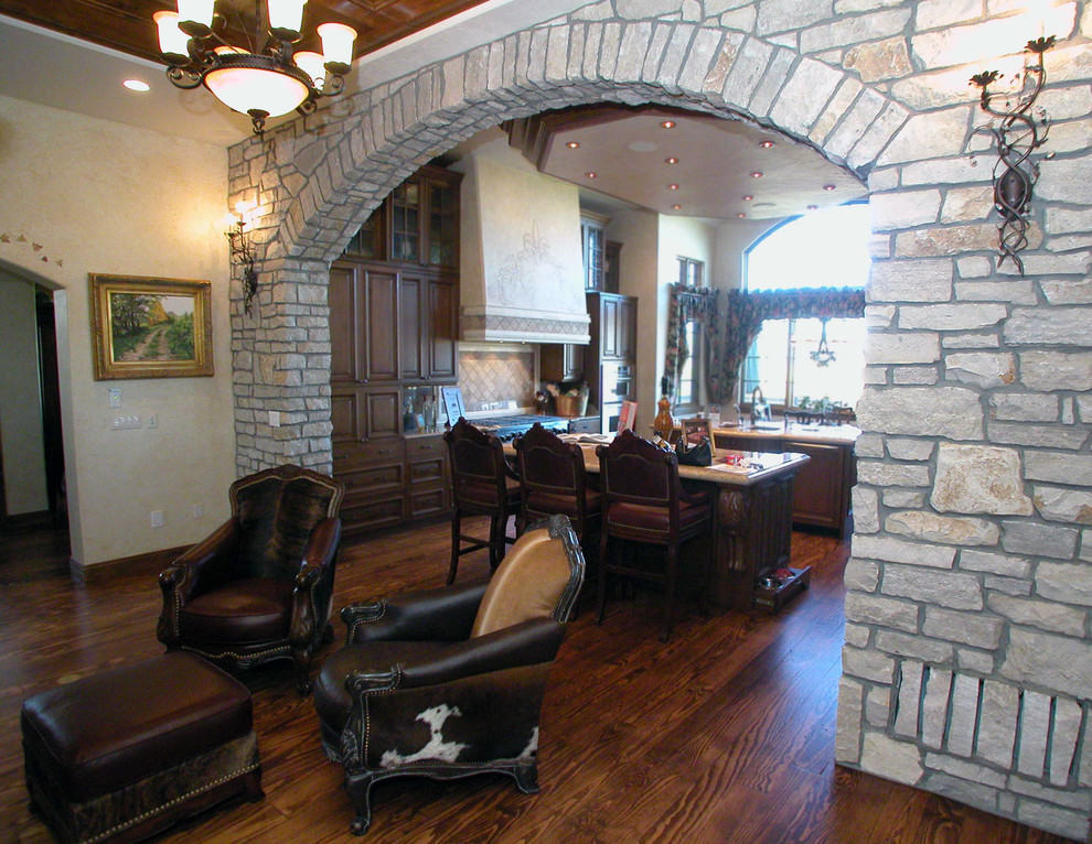 Photo of a traditional open plan living room in Other with dark hardwood flooring.