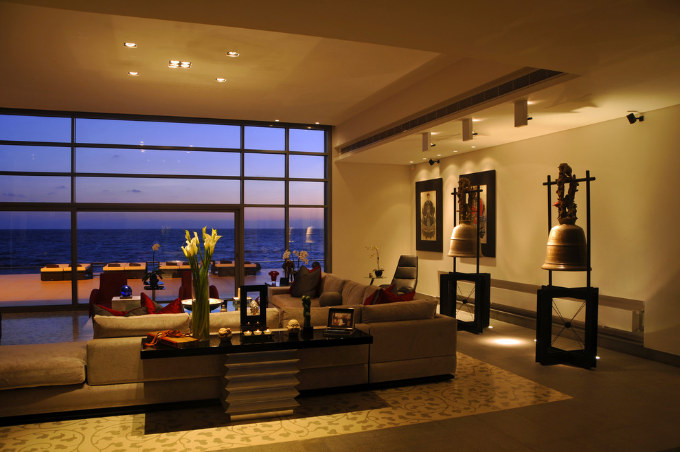 Immagine di un ampio soggiorno design con pareti beige