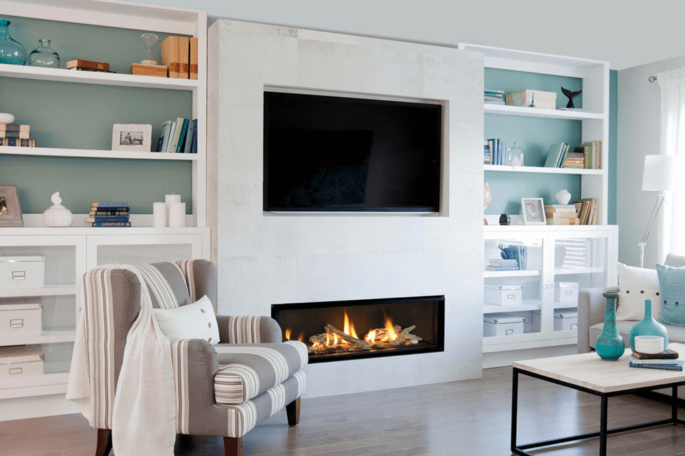 Inspiration for a medium sized contemporary open plan living room in Boston with white walls, medium hardwood flooring, a ribbon fireplace, a wall mounted tv and brown floors.