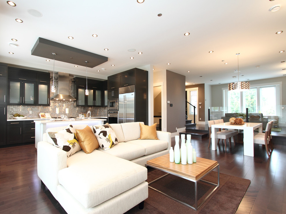 Inspiration for a contemporary open concept living room remodel in Vancouver with gray walls