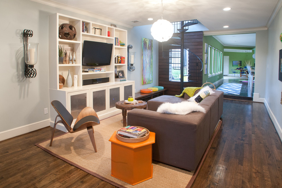 Example of a minimalist living room design in Dallas with gray walls