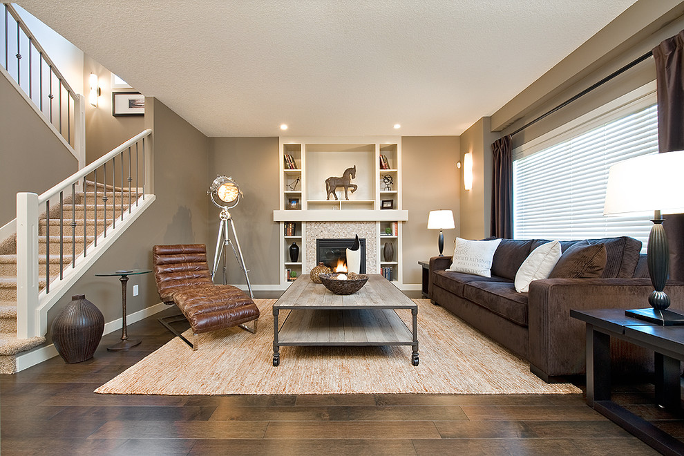 Contemporary living room in Edmonton with grey walls and a standard fireplace.