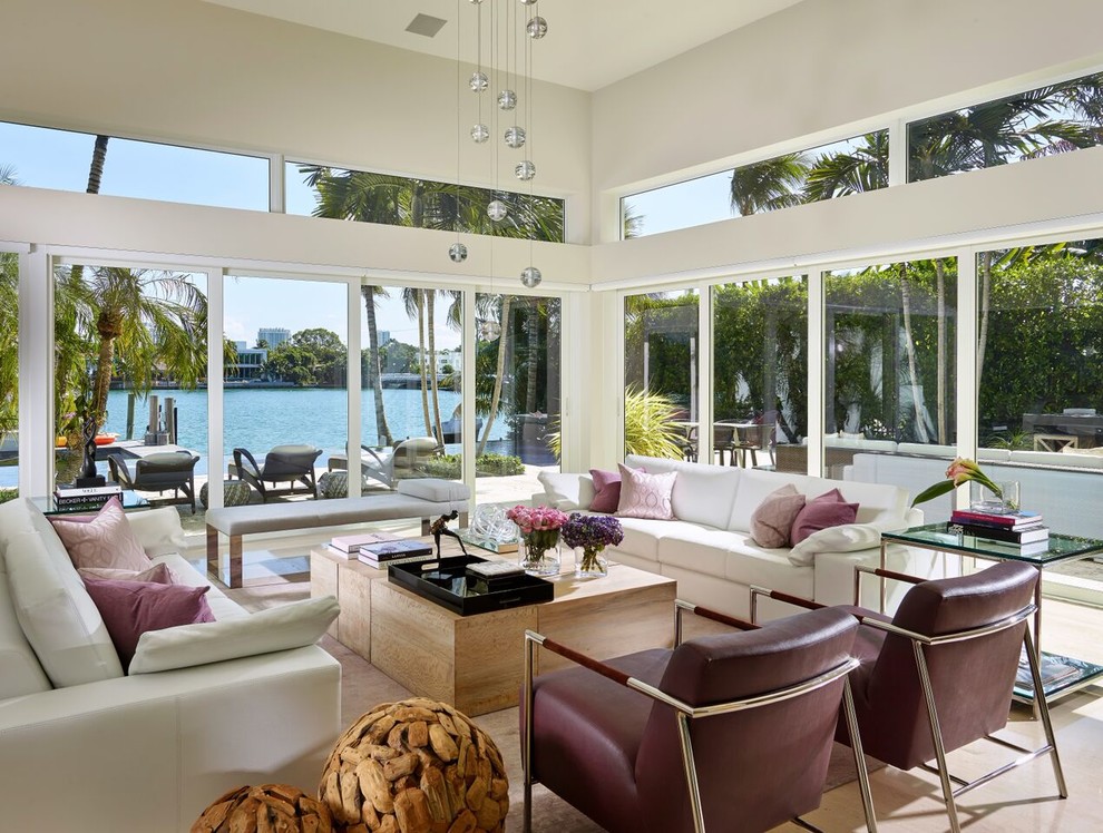 Inspiration for a large contemporary formal open plan living room in Miami with white walls and no fireplace.