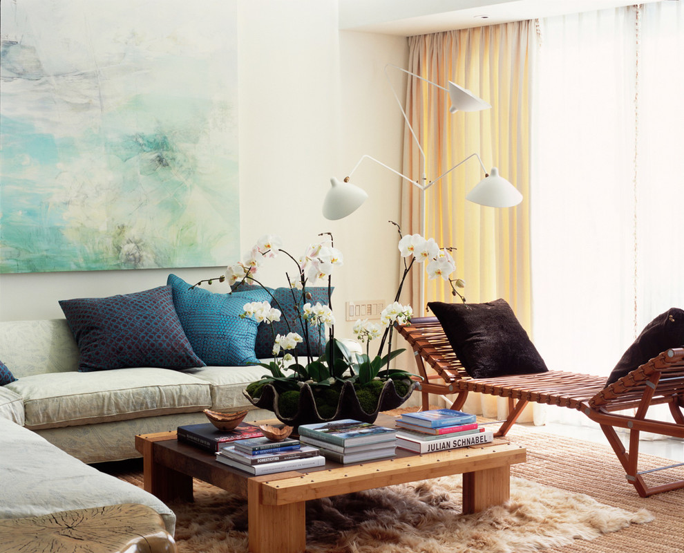 Example of a mid-sized trendy formal living room design in Los Angeles with beige walls, no fireplace and no tv