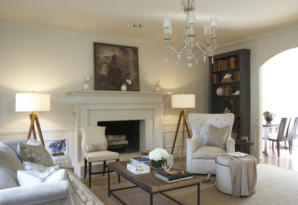 Living room - traditional living room idea in Birmingham with a brick fireplace