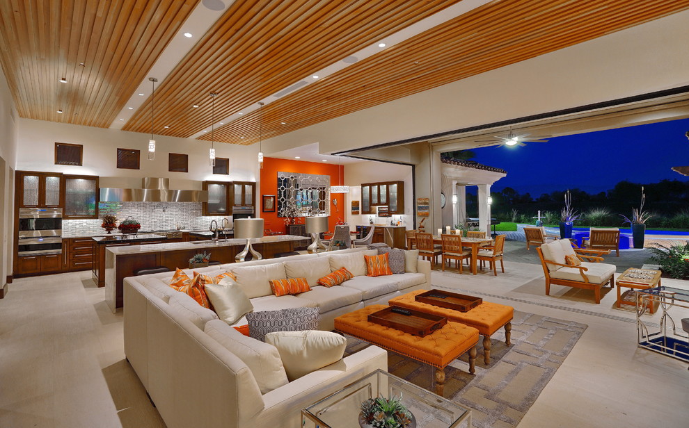 Immagine di un soggiorno design aperto con pareti beige