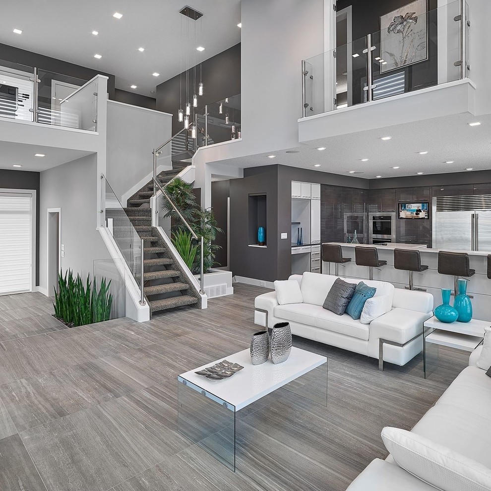 Inspiration for a contemporary open concept gray floor living room remodel in Edmonton with gray walls