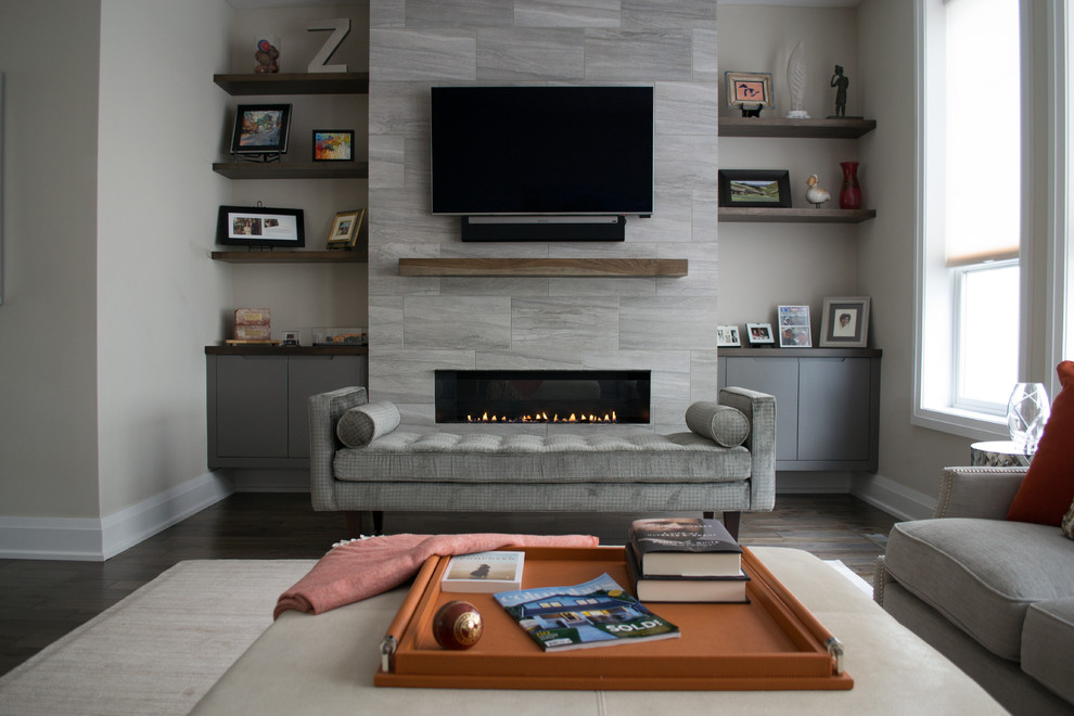 Mid-sized trendy formal and open concept dark wood floor and brown floor living room photo in Columbus with beige walls, a ribbon fireplace and a wall-mounted tv