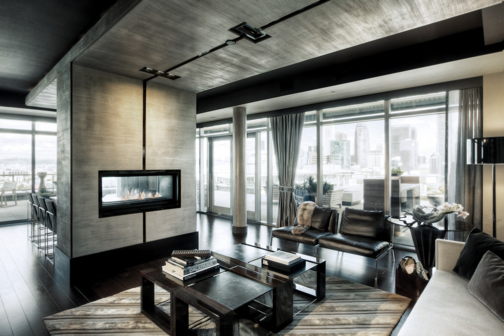 Mittelgroßes, Repräsentatives, Fernseherloses Modernes Wohnzimmer im Loft-Stil mit beiger Wandfarbe, dunklem Holzboden, Tunnelkamin, verputzter Kaminumrandung und braunem Boden in Los Angeles