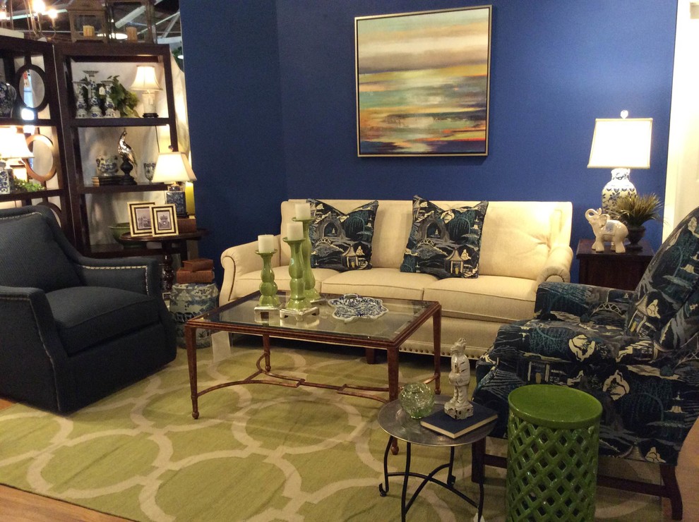 Immagine di un soggiorno classico di medie dimensioni con pareti blu