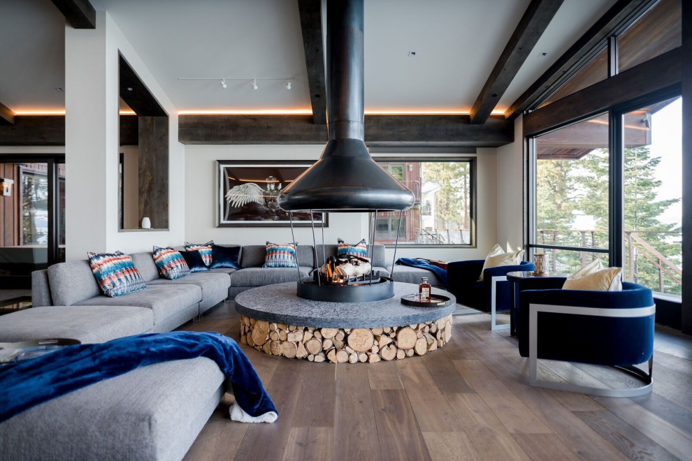 Huge mountain style living room photo in Other