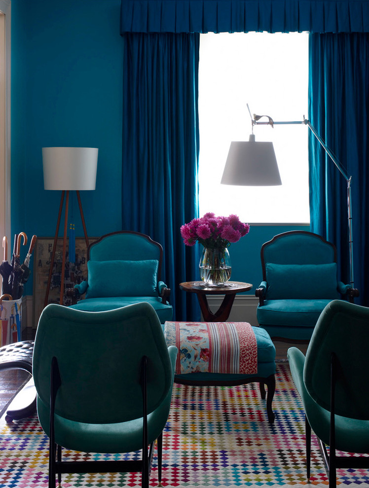 Inspiration for an eclectic living room remodel in Sydney with blue walls