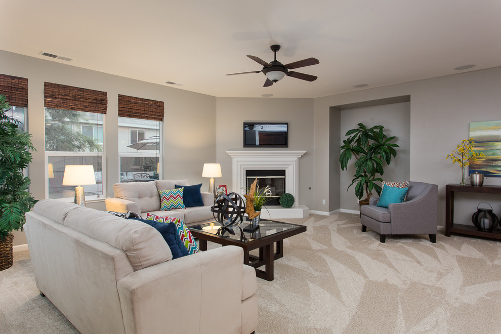 Example of a large transitional open concept carpeted living room design in Sacramento with gray walls, a corner fireplace, a wood fireplace surround and a wall-mounted tv