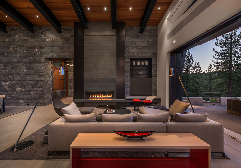 Contemporary open plan living room in San Francisco with a ribbon fireplace, beige floors, grey walls, ceramic flooring and a metal fireplace surround.