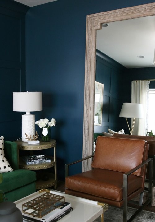 Living room - mid-sized transitional medium tone wood floor living room idea in Salt Lake City with blue walls