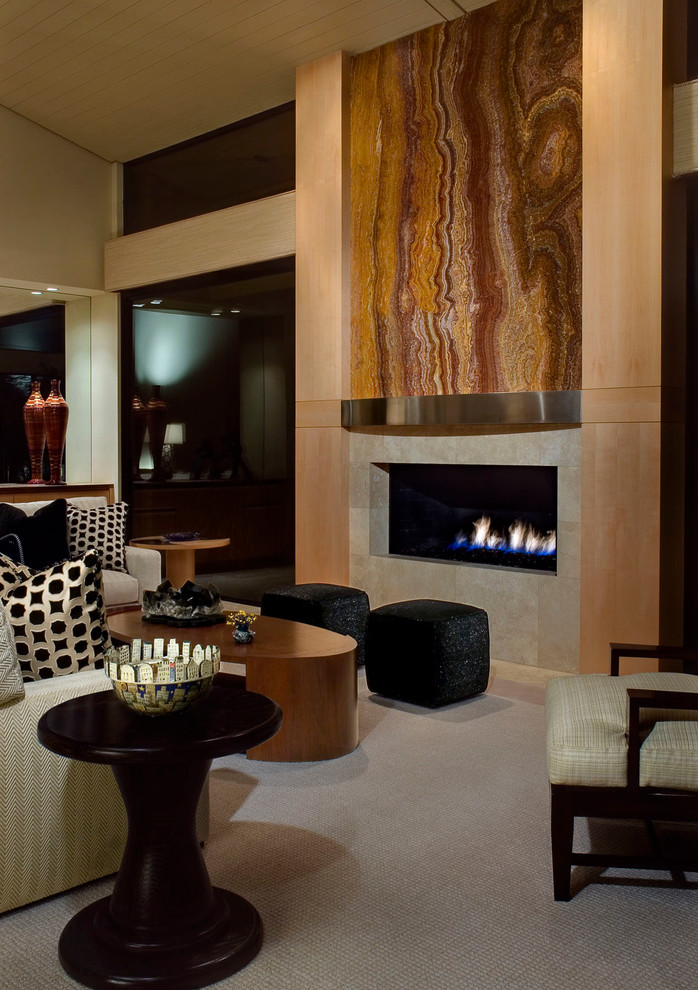 Design ideas for a contemporary living room in Los Angeles with a ribbon fireplace.