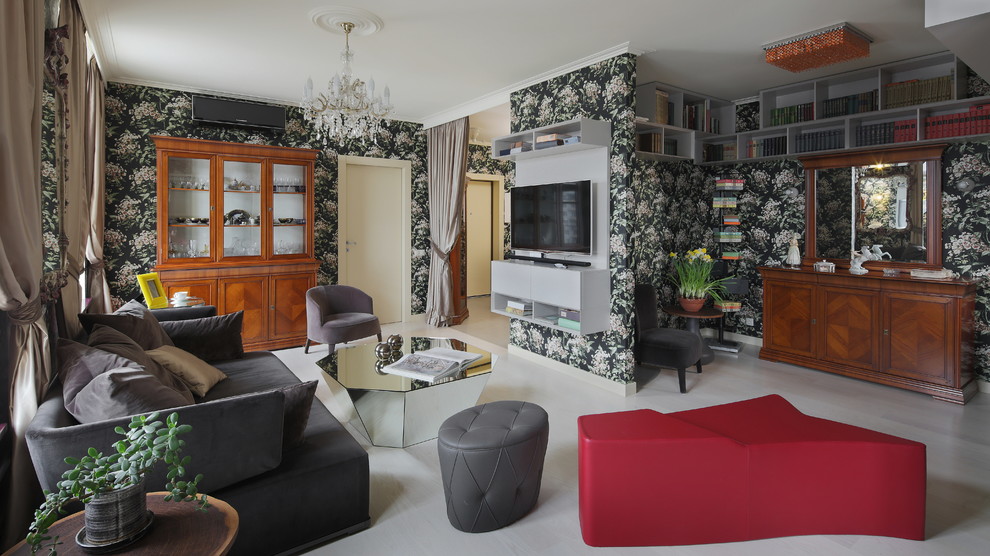 Пример оригинального дизайна: изолированная, парадная гостиная комната среднего размера в стиле фьюжн с черными стенами и телевизором на стене