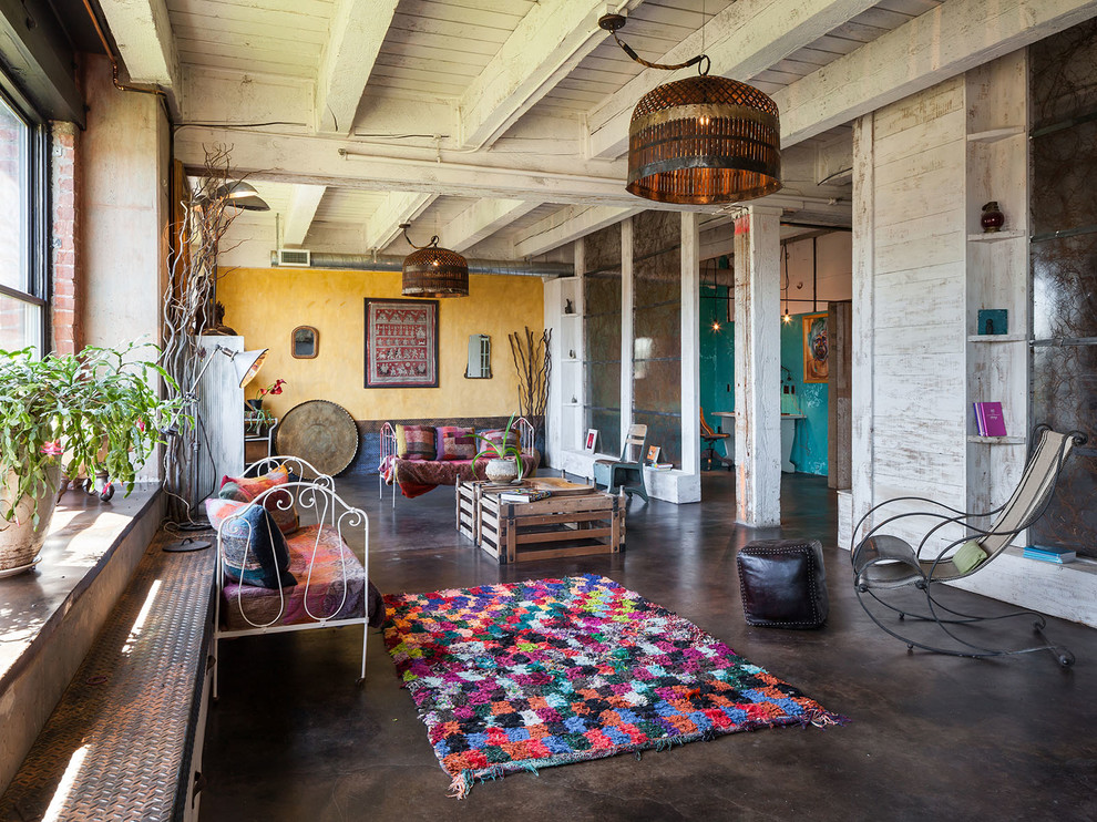 Inspiration for an eclectic concrete floor living room remodel in Portland with no tv