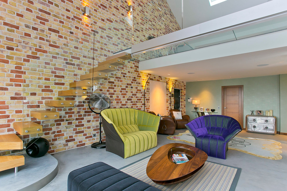 Contemporary living room in London with concrete flooring.