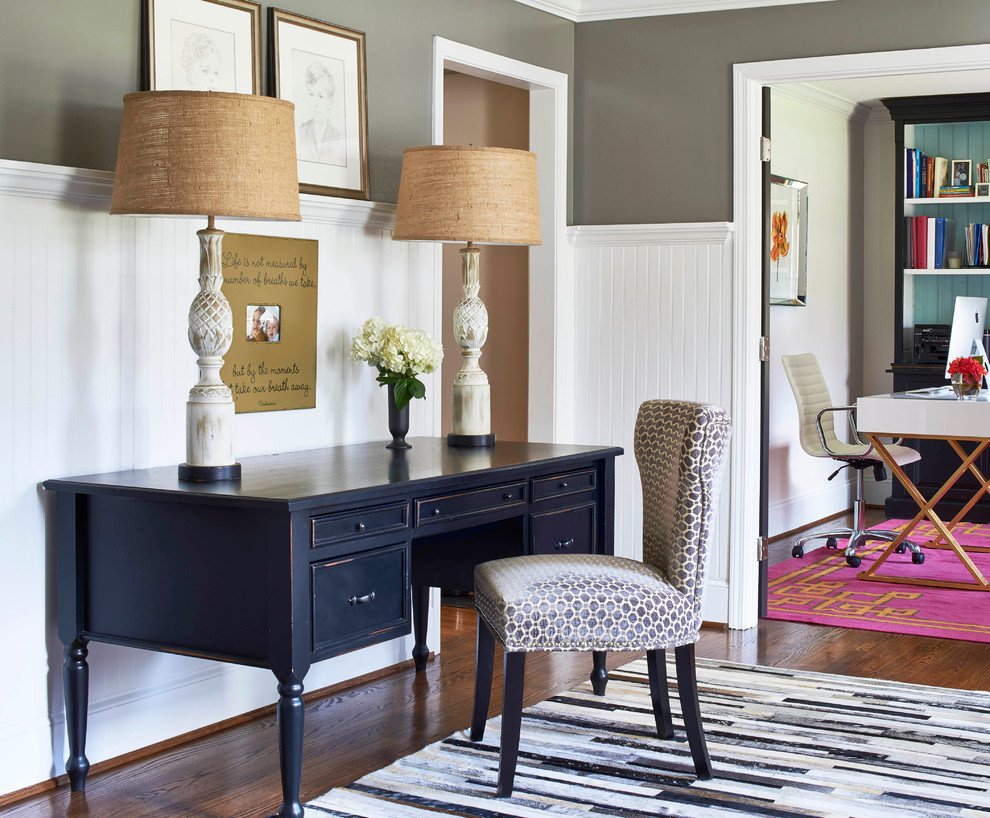 Example of a transitional home office design in Charlotte