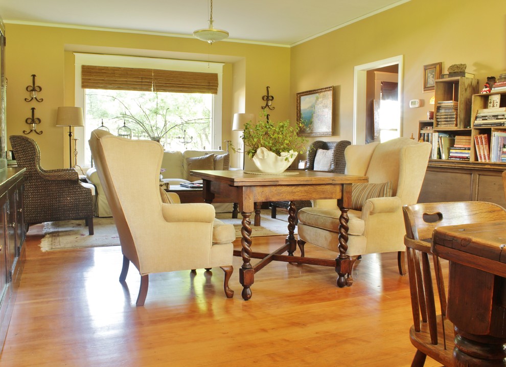 This is an example of a medium sized rural dining room in Seattle with beige walls and medium hardwood flooring.