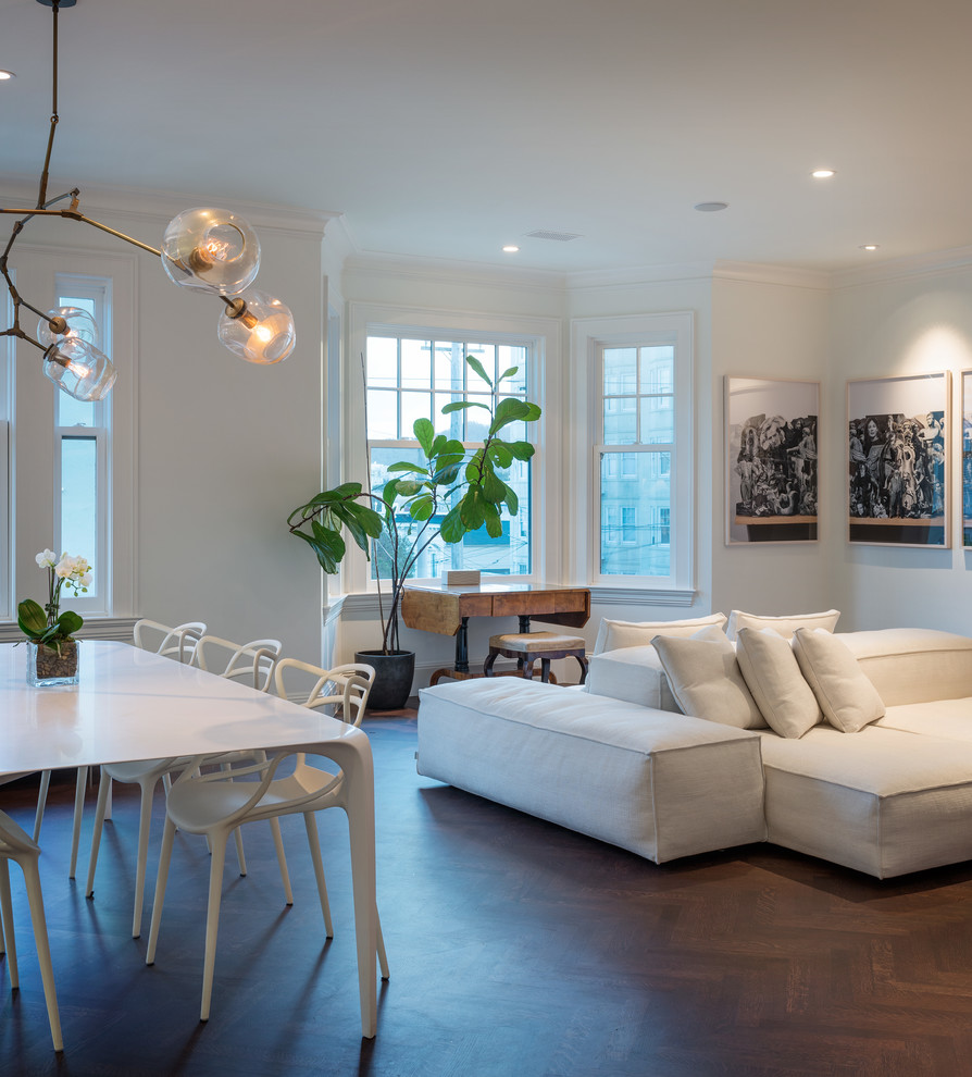 Living room - contemporary open concept dark wood floor living room idea in San Francisco with white walls