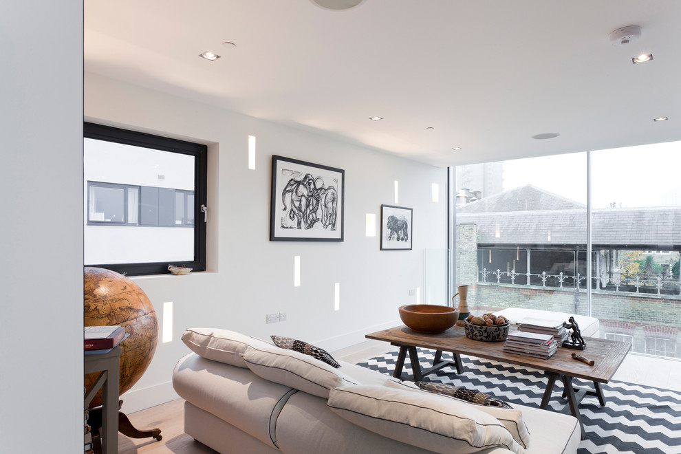Источник вдохновения для домашнего уюта: парадная гостиная комната в скандинавском стиле с белыми стенами