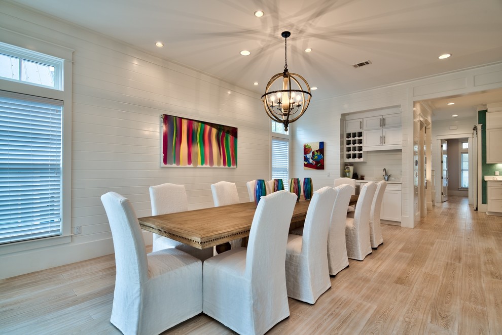 Photo of a beach style dining room in Miami.