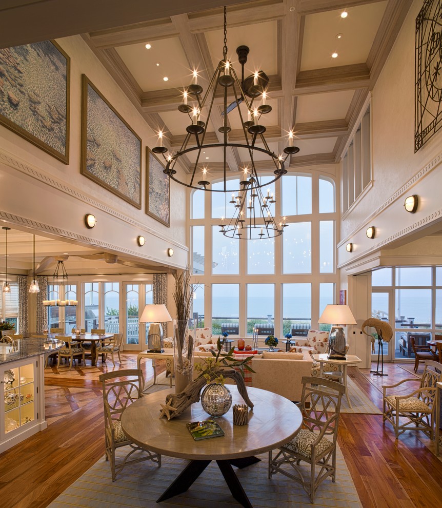 Expansive nautical open plan living room in Philadelphia with beige walls, no tv and medium hardwood flooring.