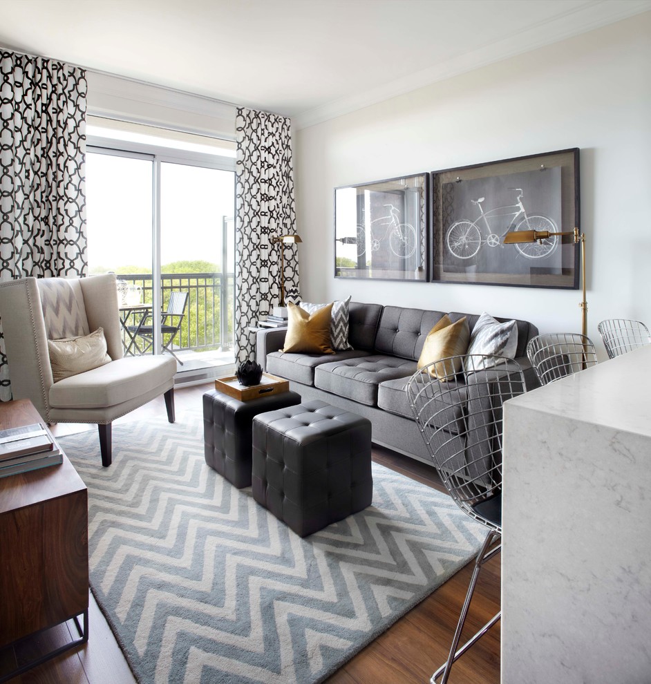 Transitional formal medium tone wood floor living room photo in Toronto with white walls