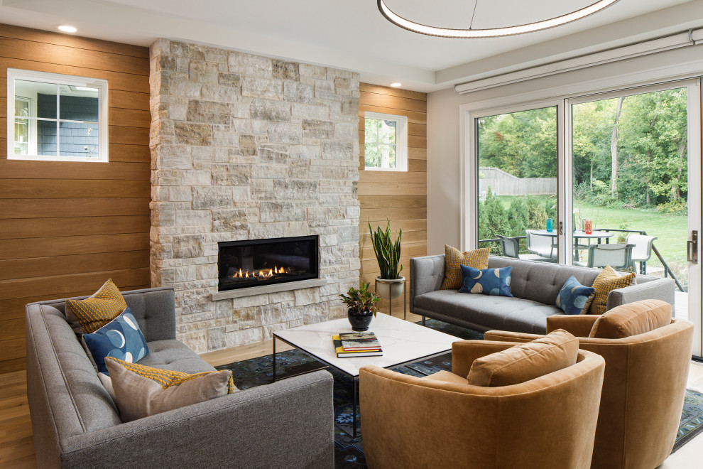 Идея дизайна: открытая гостиная комната среднего размера в стиле модернизм с горизонтальным камином, фасадом камина из камня, коричневым полом и деревянными стенами