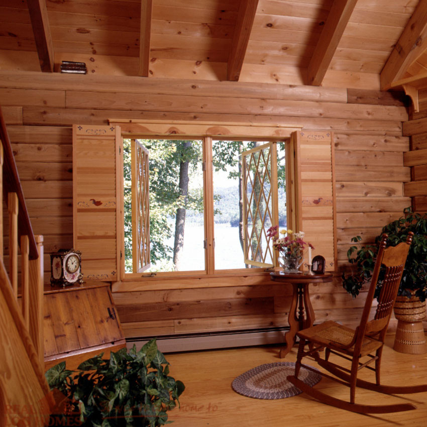 Inspiration for an open concept medium tone wood floor living room remodel in Burlington