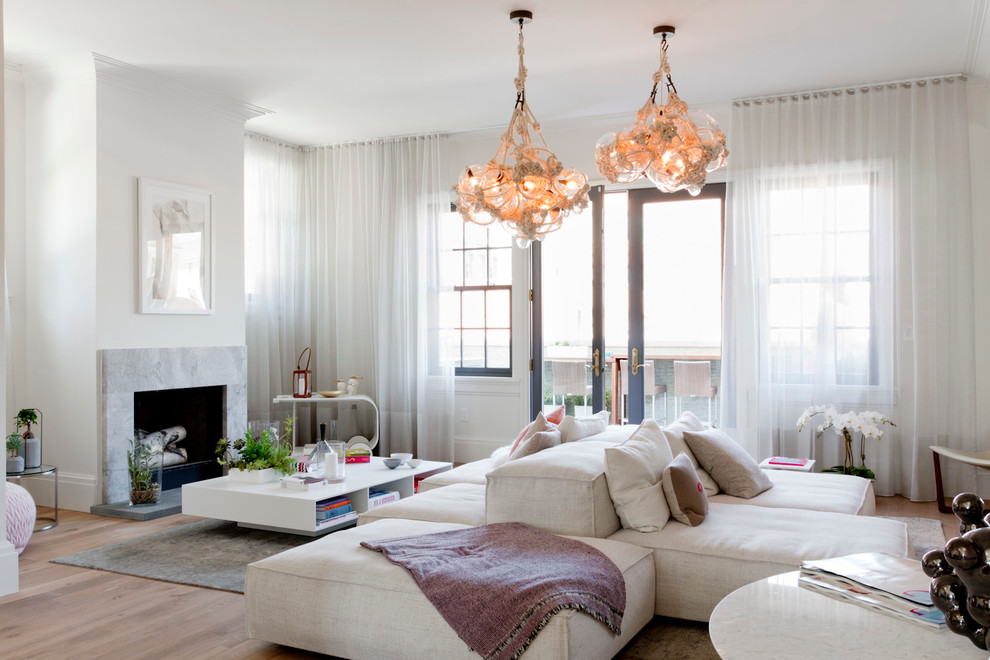 Example of a trendy formal light wood floor living room design in New York with a standard fireplace