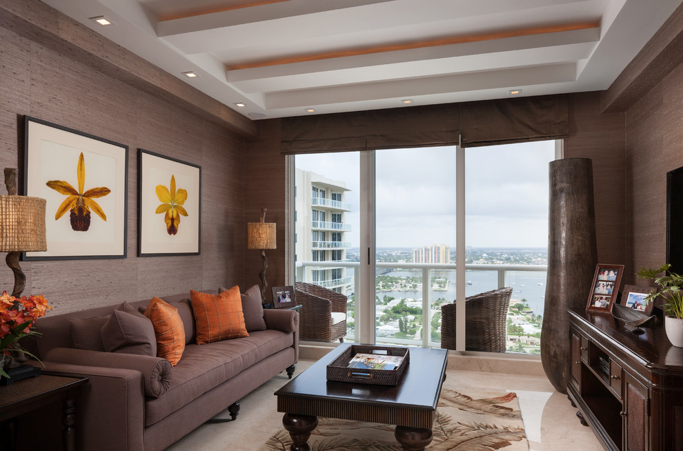 Medium sized contemporary enclosed living room in Miami with brown walls, marble flooring and beige floors.