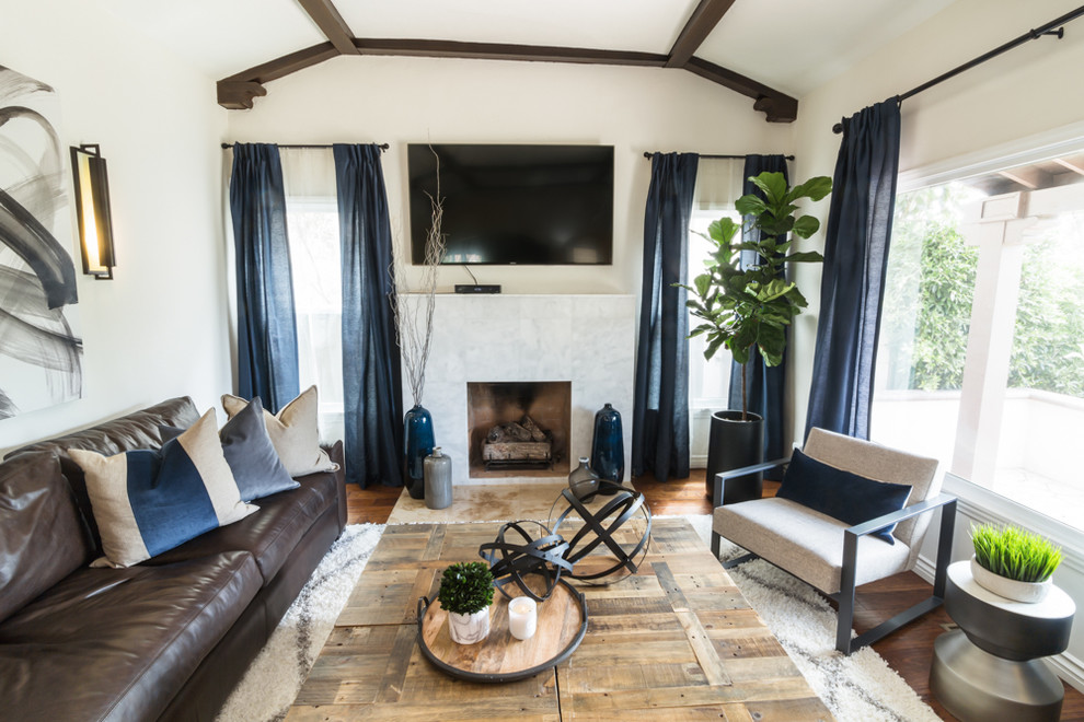 Mid-sized transitional open concept dark wood floor living room photo in Los Angeles with white walls, a standard fireplace, a tile fireplace and a wall-mounted tv