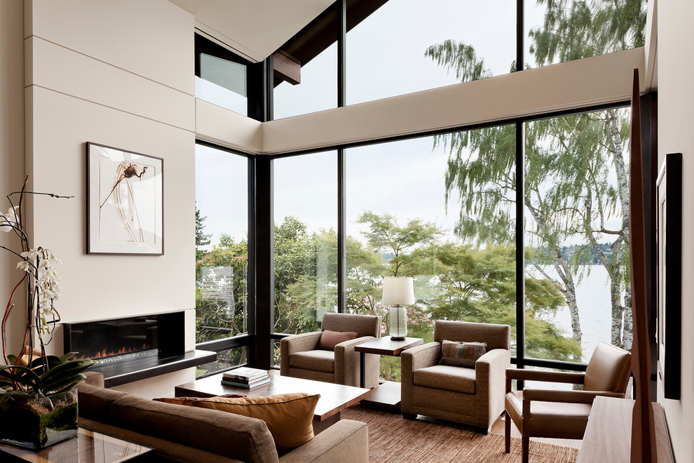 Example of a large transitional open concept medium tone wood floor living room design in Seattle with white walls, a ribbon fireplace and a metal fireplace