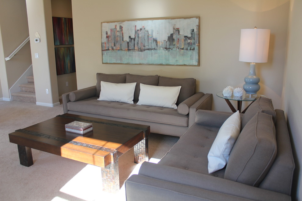 Inspiration for a modern grey and teal living room in Sacramento.