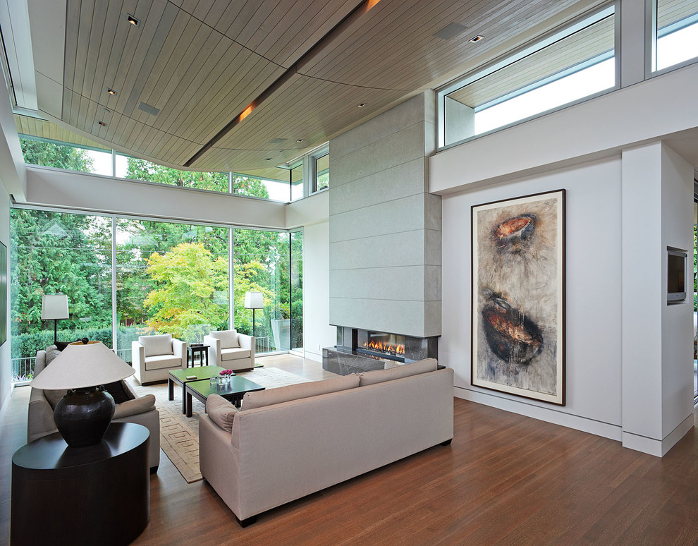 Inspiration for a contemporary living room in Vancouver with white walls.