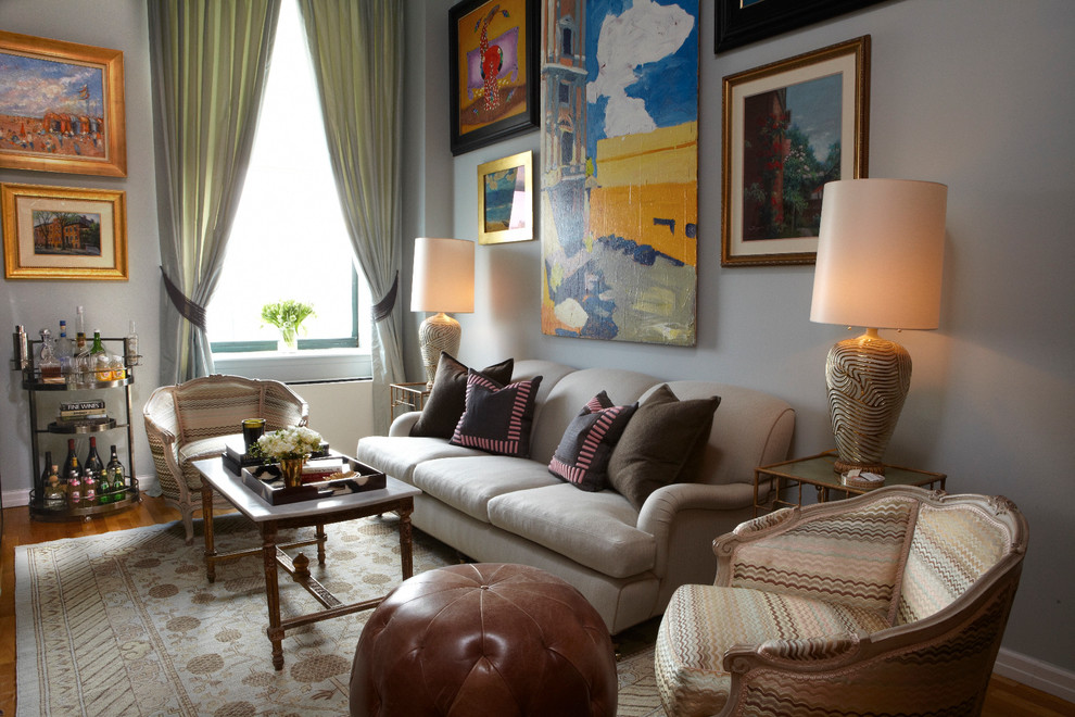 Example of an eclectic living room design in New York with gray walls