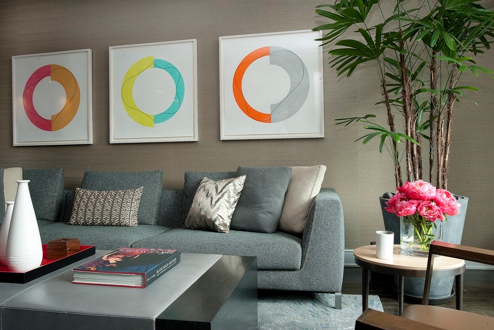 Inspiration for a large contemporary open concept dark wood floor living room remodel in New York with beige walls and a wall-mounted tv