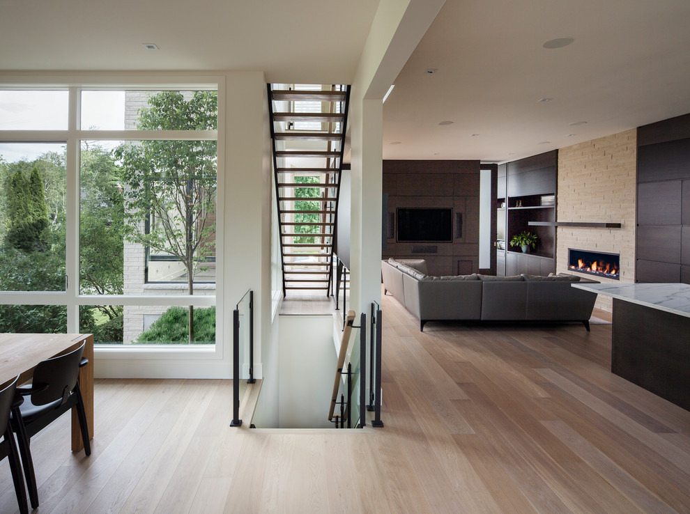 Living room - contemporary living room idea in Ottawa with white walls