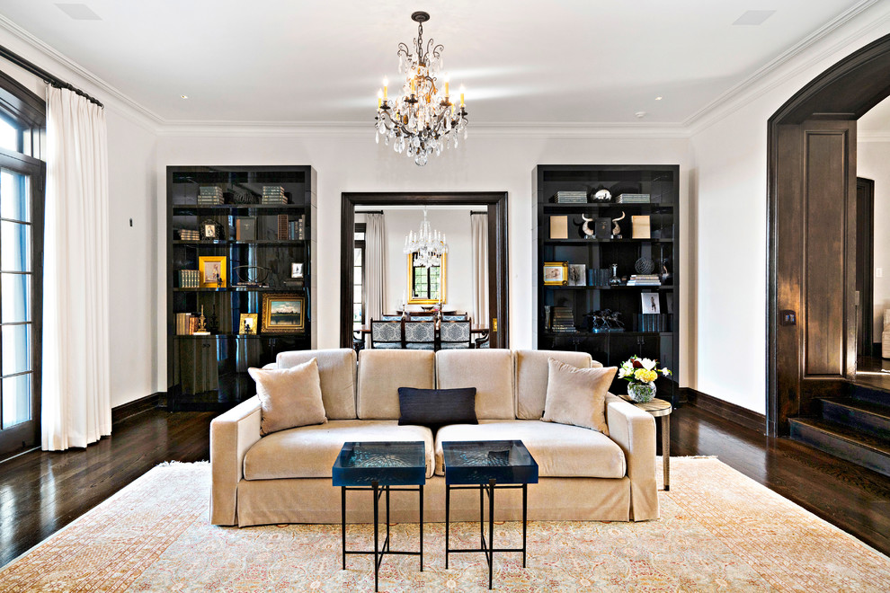This is an example of an expansive classic formal living room in New York with dark hardwood flooring.