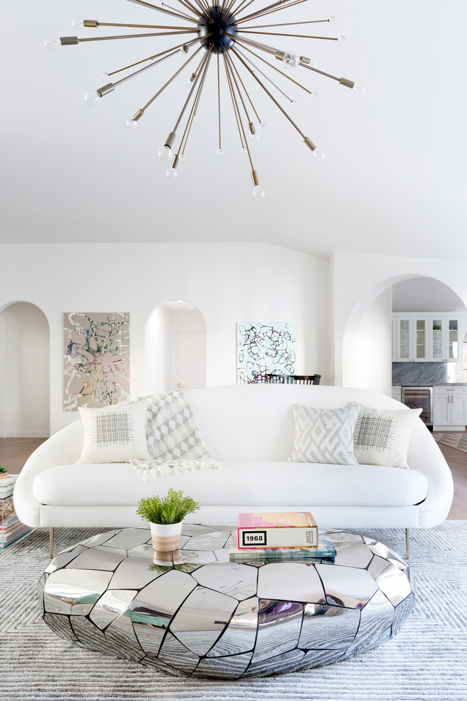 Photo of a large retro formal open plan living room in Los Angeles with white walls, beige floors, light hardwood flooring, a ribbon fireplace, a tiled fireplace surround and no tv.