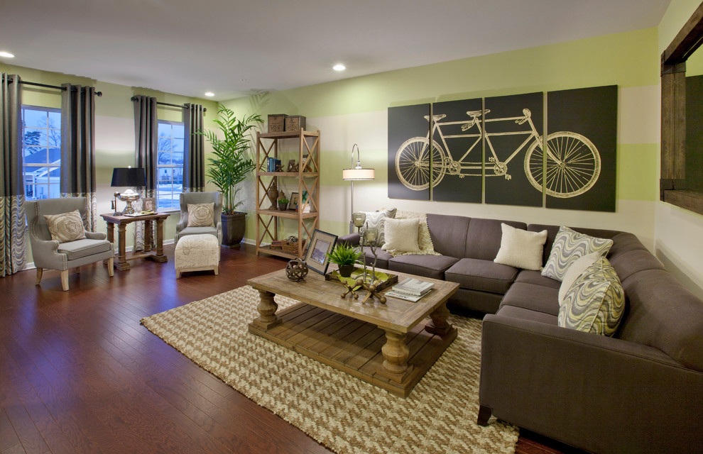 Living room - transitional dark wood floor living room idea in New York with green walls