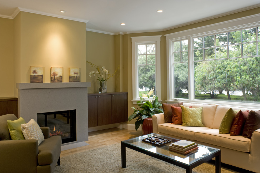 Design ideas for a traditional living room in San Francisco with beige walls and a standard fireplace.